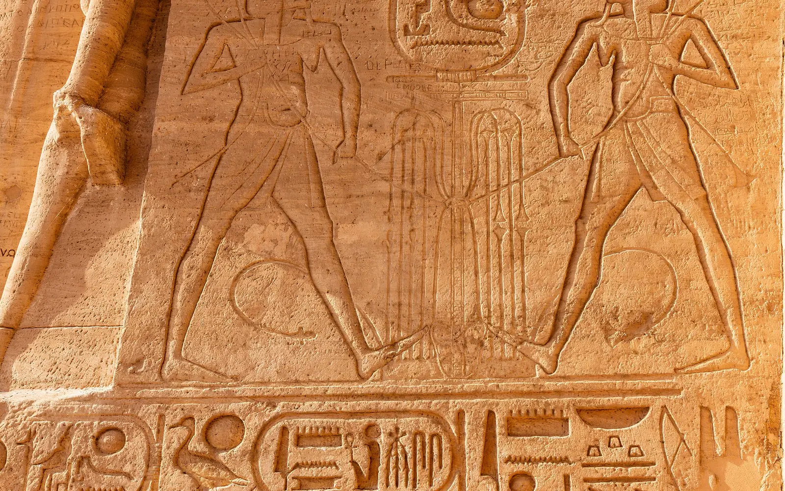 Carved prisoners and royal symbols at Abu Simbel Temple