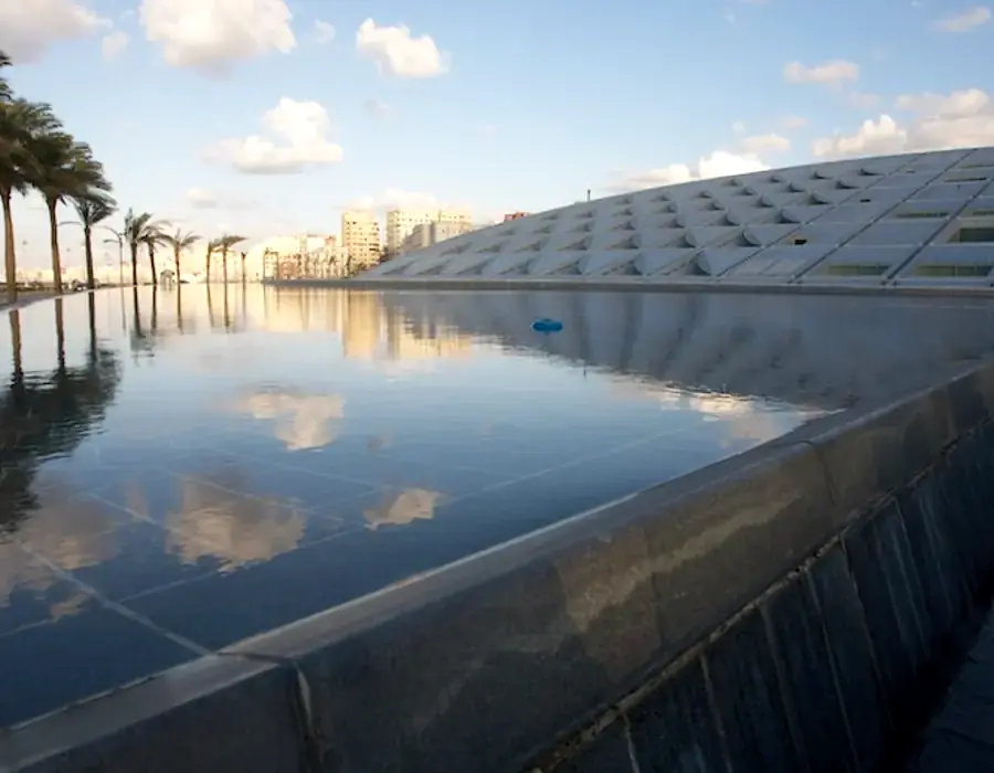 Modern Bibliotheca Alexandrina beside the Mediterranean