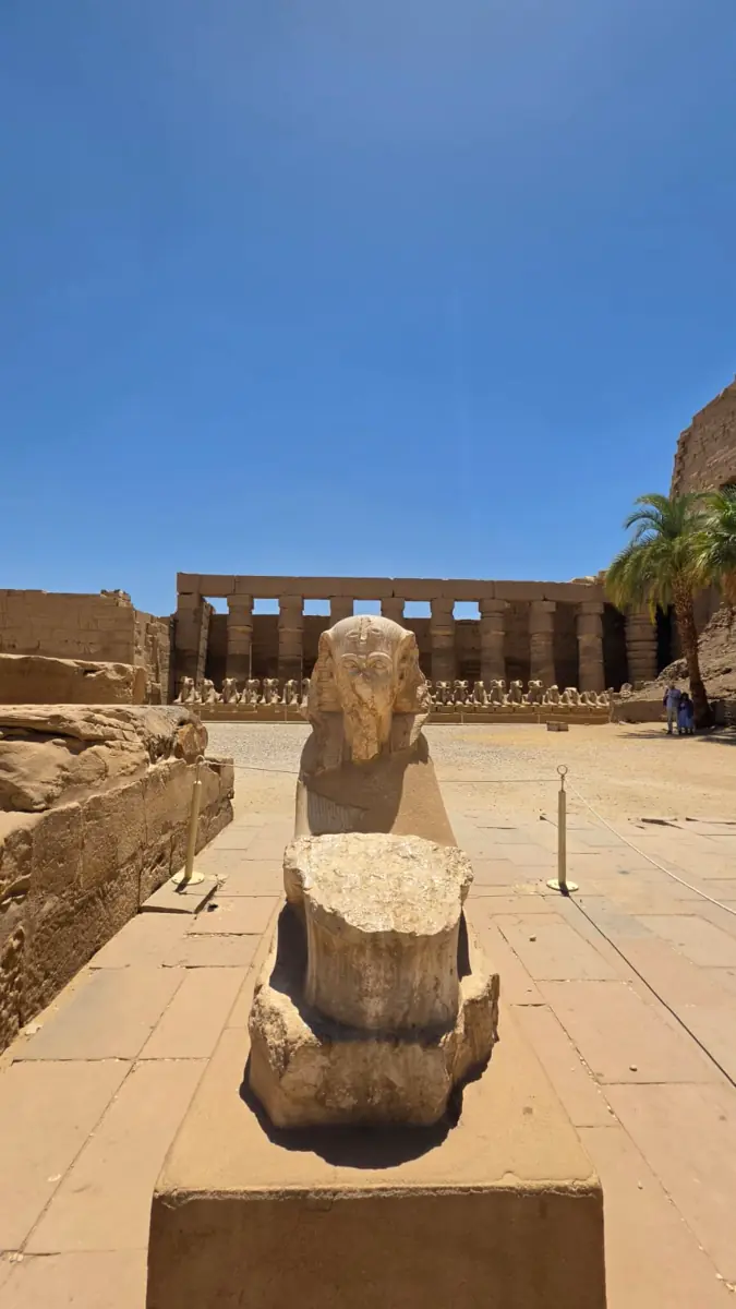 Sphinx court and royal head at Karnak Temple in Luxor