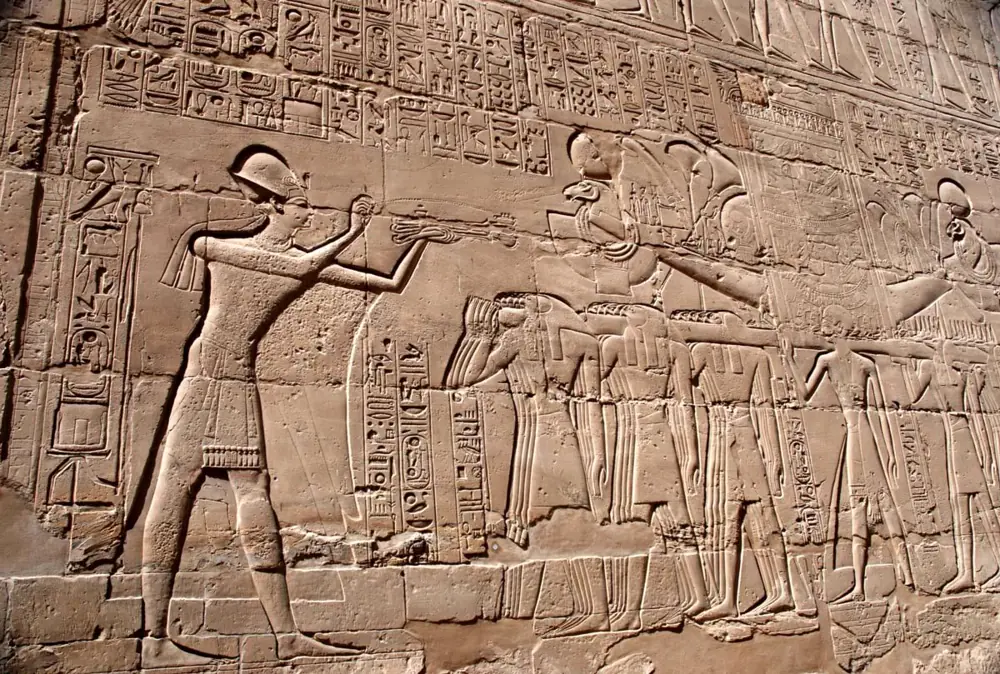 Pharaoh presenting offerings to the gods at Karnak Temple in Luxor